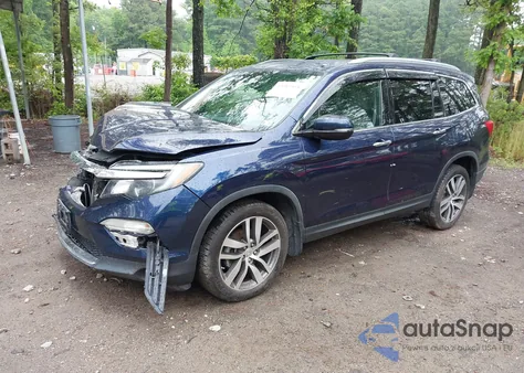 2016 Honda Pilot Touring z USA, uszkodzony, nr VIN 5FNYF6H9XGB034420
